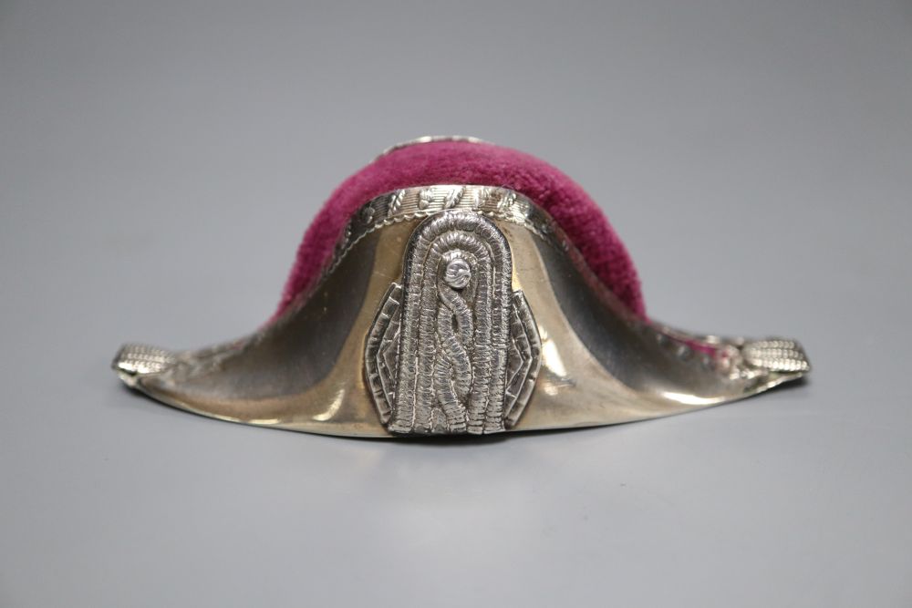 An Edwardian novelty silver pin cushion, modelled as a Napoleon hat, S. Blanckensee & Son, Chester, 1908, 10.3cm.